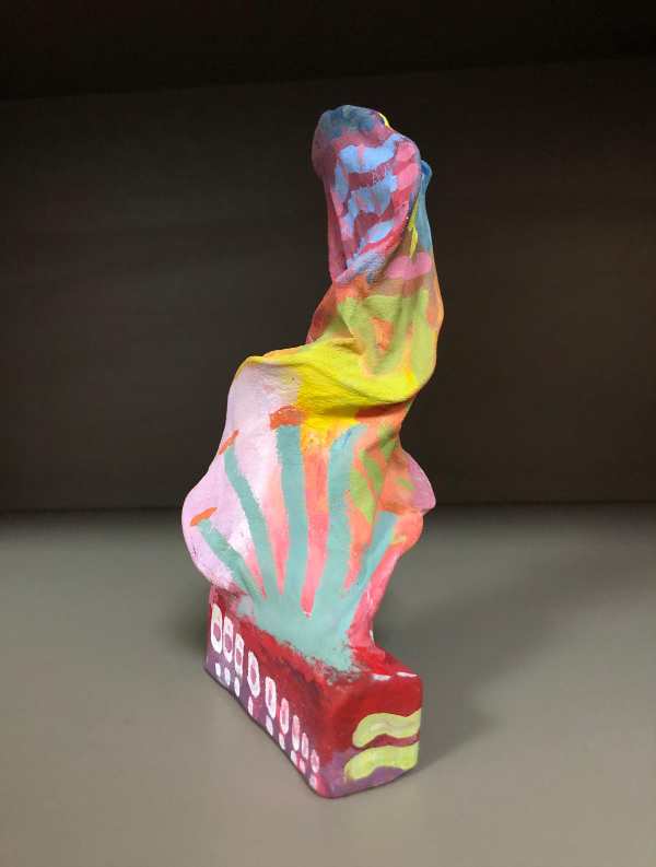 Colourfully painted abstract sculpture created by a student.